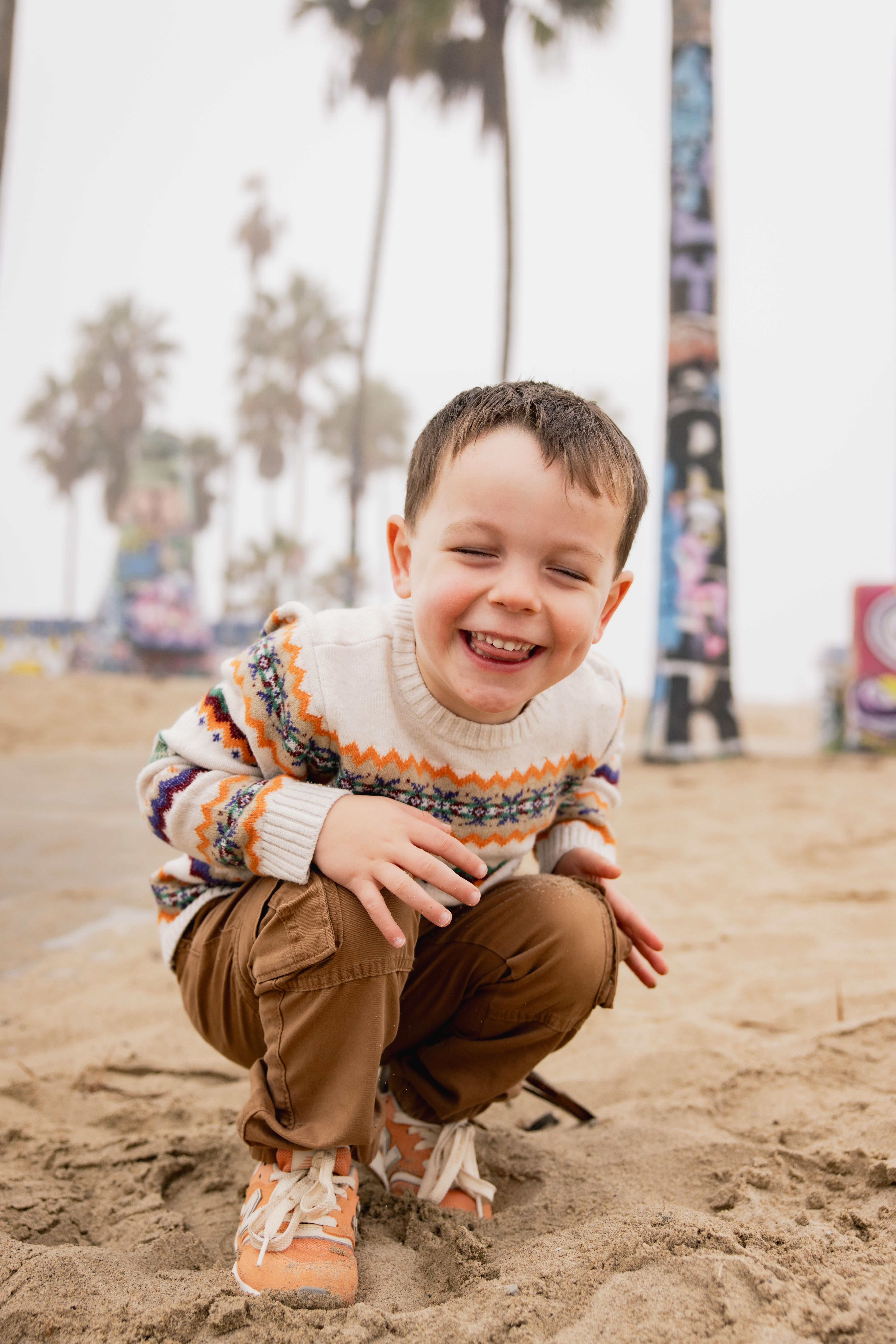 Young boy smiling at Venice Beach family photo session
