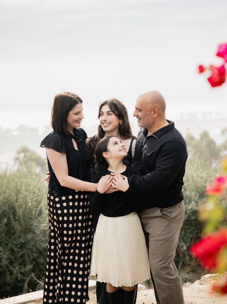 Family of four. Los Angeles lifestyle family photography in Ventura. Natural, candid portraits that capture authentic Candid, family moments with beautiful views.